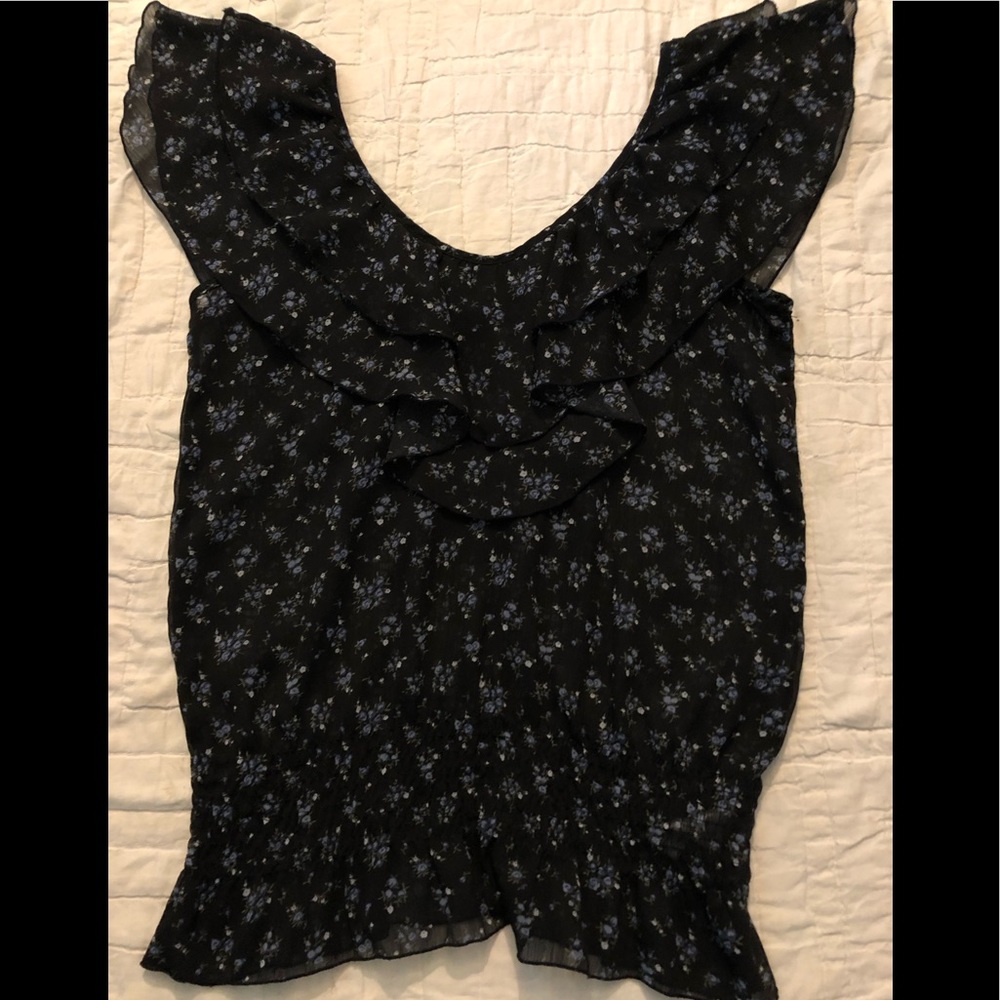 Miley Cyprus black blue floral sleeveless blouse